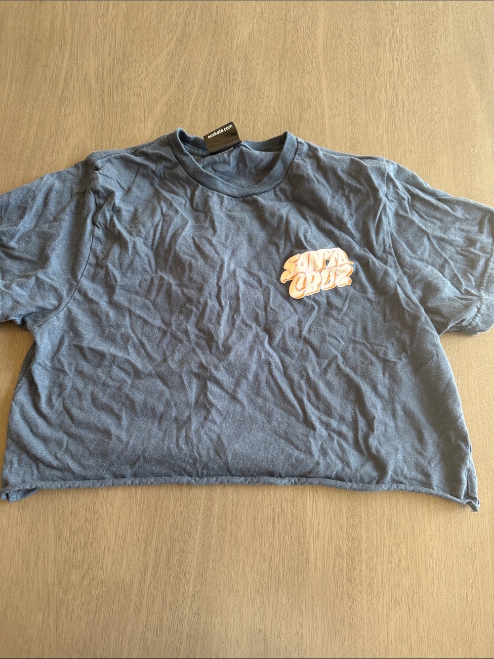 Santa Cruz Skateboards Blue Cropped Graphic Tee with Peach Logo
